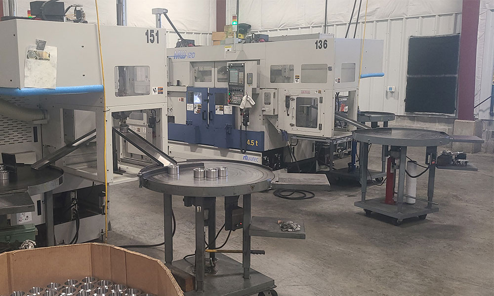 Automated powder metal production cells